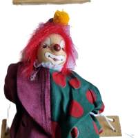 Cute hand-painted clown on a swing 16cm x 10cm